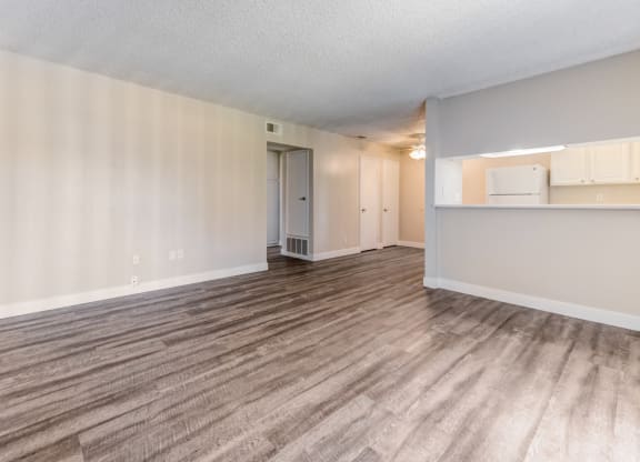 Spacious living room and dining room at Redlands Park Apts, Redlands, CA