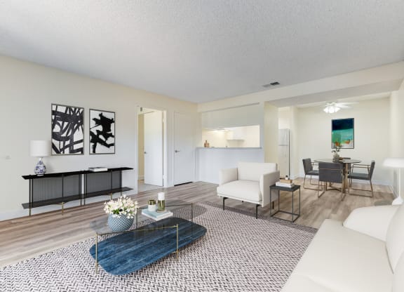 a living room with a white couch and a coffee table at Redlands Park Apts, California, 92373
