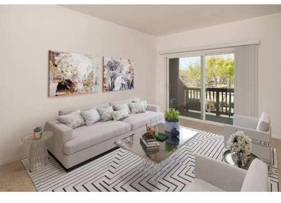 a living room with a couch and a table  at Seville at Gale Ranch, San Ramon