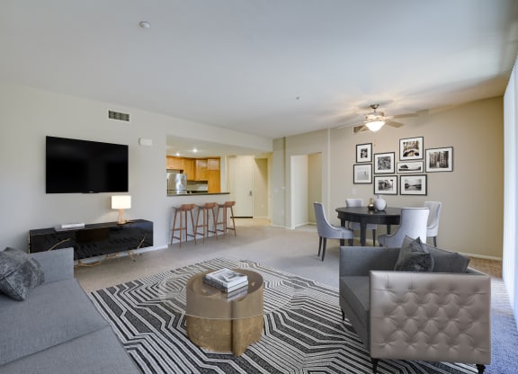 a living room with a couch and a chair  at Sonoma at Porter Ranch, Porter Ranch