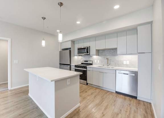 Kitchen with stainless steel appliances and island at The Overlook Santa Clarita, CA 91350
