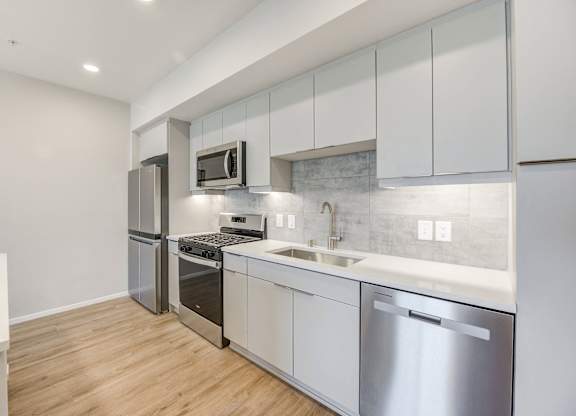 Kitchen with stainless steel appliances at The Overlook Santa Clarita, CA 91350
