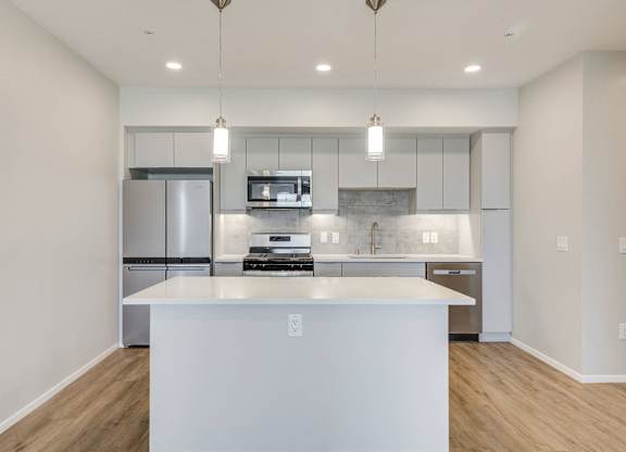 Kitchen with stainless steel appliances at The Overlook Santa Clarita, CA 91350