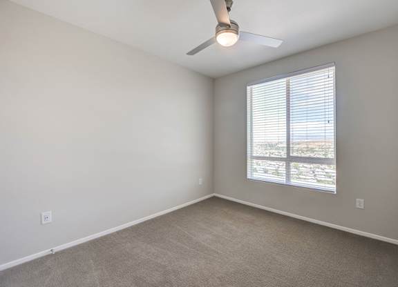Secondary bedroom with ceiling fan at The Overlook Santa Clarita, CA 91350