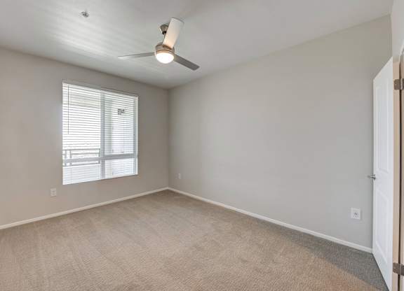 Guest Bedroom with ceiling fan at The Overlook Santa Clarita, CA 91350
