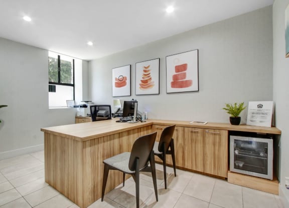 a room with a desk and two chairs at The Kenmore Los Feliz, California