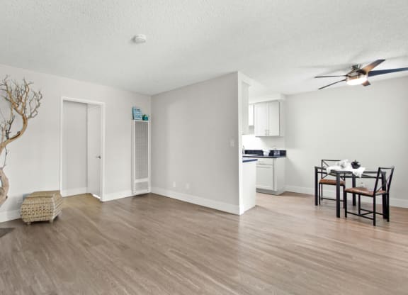 the living room and dining room of an apartment at Clair Del and Clair Del Gardens, Long Beach, CA, 90807