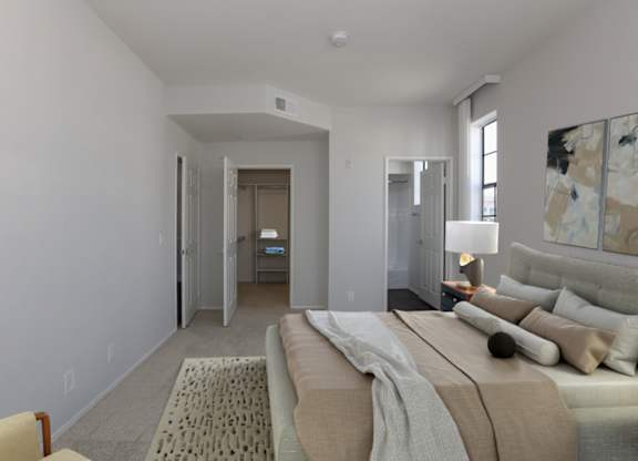 A bedroom with a large bed and a painting on the wall at Burton Apartments, Los Angeles, 90048
