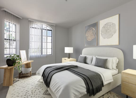 a bedroom with grey walls and a white bed at Burton, Los Angeles, CA