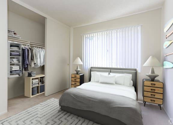 a bedroom with a bed and a closet at Clair Del and Clair Del Gardens, California