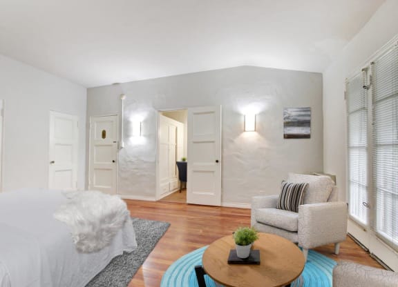 a bedroom with a bed and a chair  at 1022 Tiverton, Los Angeles, California