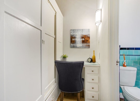 a small desk in a bathroom next to a toilet  at 1022 Tiverton, Los Angeles, 90024
