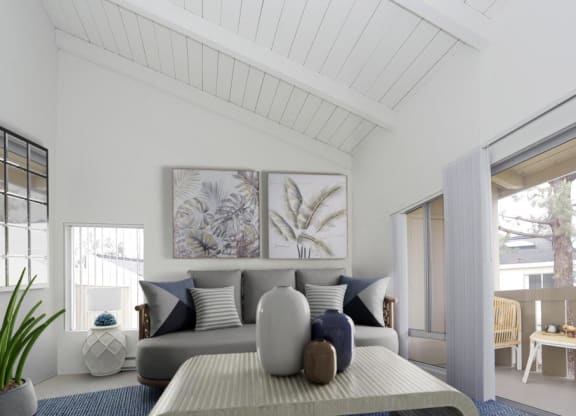 a living room with a couch and a table at The Villas at Monarch Beach, California, 92629