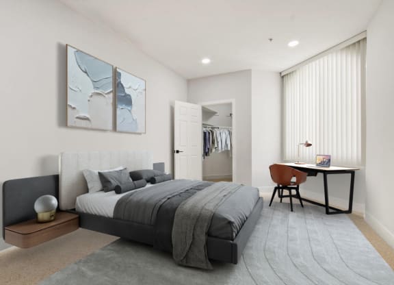 a bedroom with a bed and a desk at Burton, Los Angeles, CA, 90048