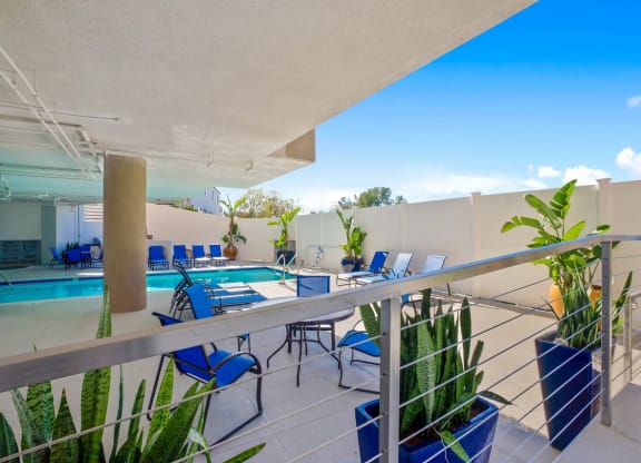 Pool side sitting area1at Midvale Apartments, California, 90024