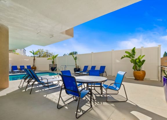 Pool side sitting area at Midvale Apartments, California