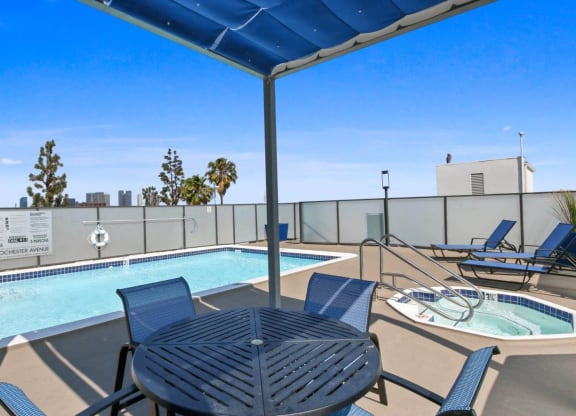 Poolside Dining Table at Rochester Apartments, Los Angeles, CA, 90024