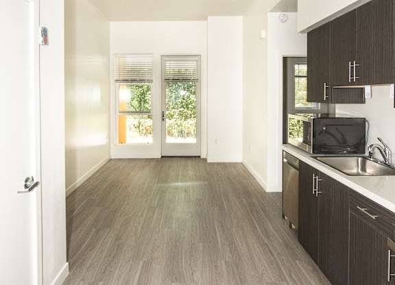 Sample Unit: Interior of Unit with windows and kitchen