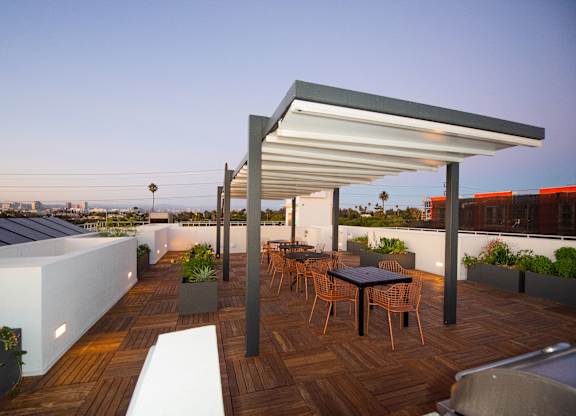 Roof Terrace with Tables and Chairs and Awnings
