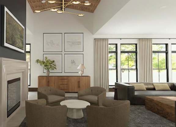 A living room with a fireplace, couches, and a coffee table.