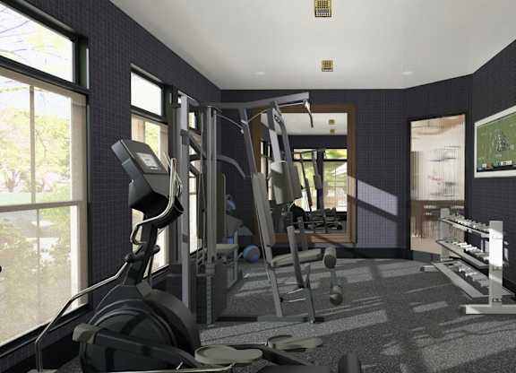 A gym with a variety of equipment including treadmills, weights, and exercise machines.