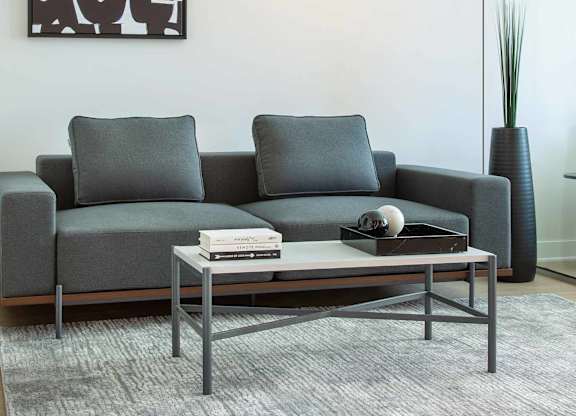 Living Room Couch Coffee Table at Wilshire Margot, California, 90024
