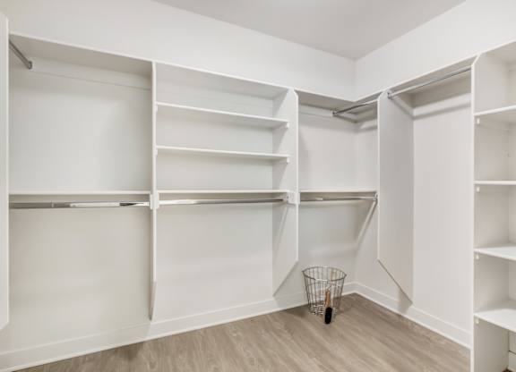A white closet with shelves at Wilshire Margot, Los Angeles, CA 