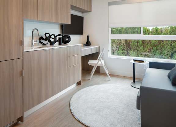 Living Area With Desk at The Aster, Los Angeles, CA, 90024