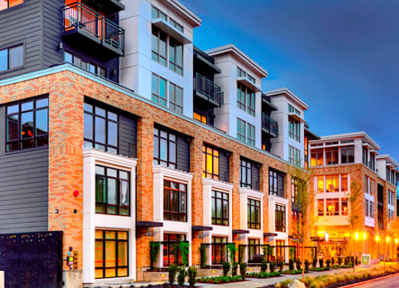 Modern apartment building with brick and contemporary facade at The Lyric Apartments, Seattle, 98102
