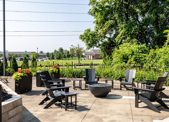 Patio with firepit at Hidden Lakes Apartments, Clarkston, MI