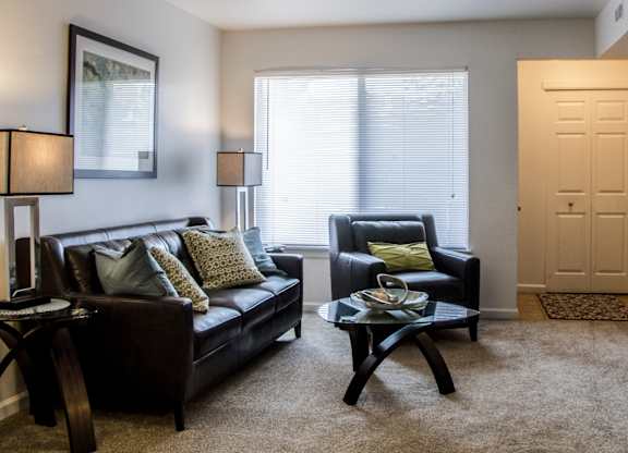 Living Room with TV at Pine Ridge Apartments, Rochester Hills, MI, 48307