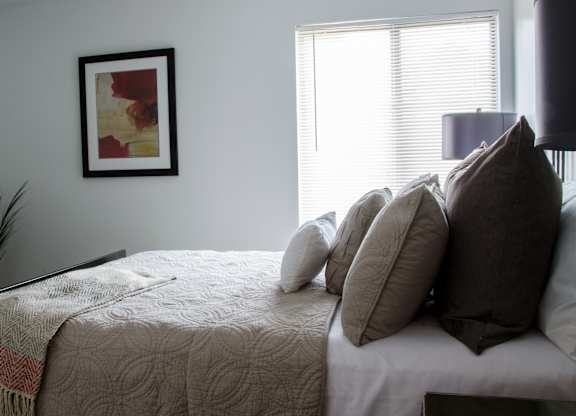 Cozy bed at Pine Ridge Apartments, Rochester Hills, Michigan