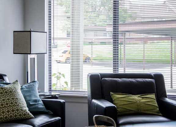 Black leather couch at Pine Ridge Apartments, Rochester Hills, MI