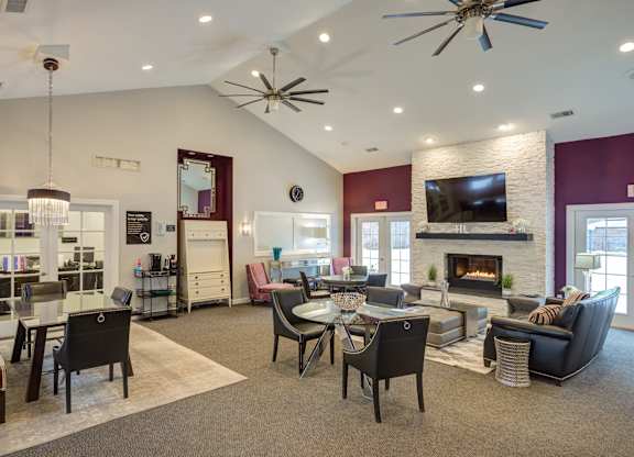 Living Room with Fireplace at Hidden Lakes Apartments, Clarkston, MI