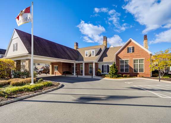 A building with a flag on top of a pole at Meridian West Shore, Mechanicsburg, PA