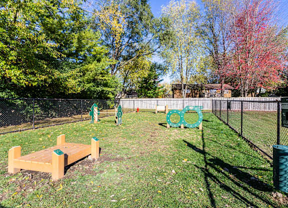 Park with a wooden bench at fifty9 Grove Apartments, Naperville, Illinois