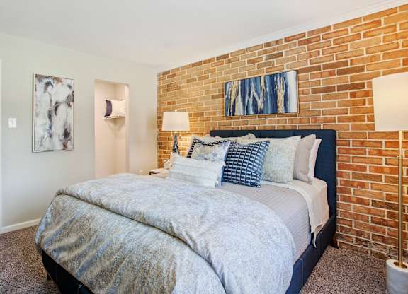 Bedroom with bed at fifty9 Grove Apartments, Naperville, IL