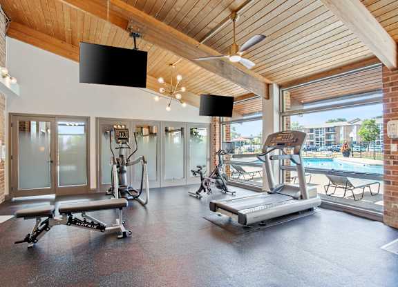 Gym with exercise bikes at fifty9 Grove Apartments, Illinois, 60563