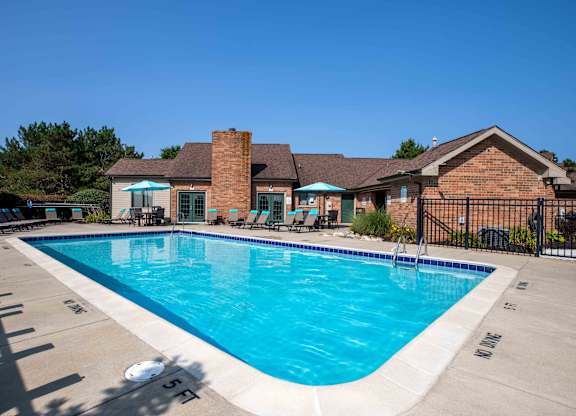 Clear blue pool view at Pine Ridge Apartments, Rochester Hills, 48307
