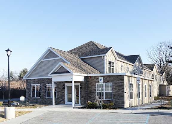 House Exterior with Parking Lot at Iroquois Village, New York, 12309