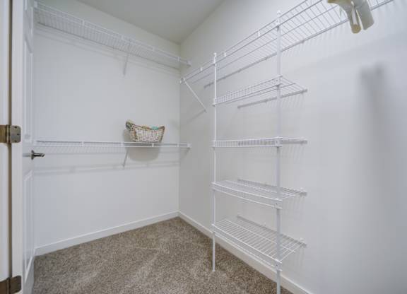 Empty white shelving unit in a room at The Crest at Elm Tree, Mount Joy, PA