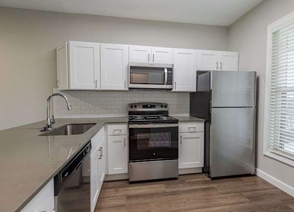 Kitchen with Sink at Woodland Meadows, Clinton Township, Michigan