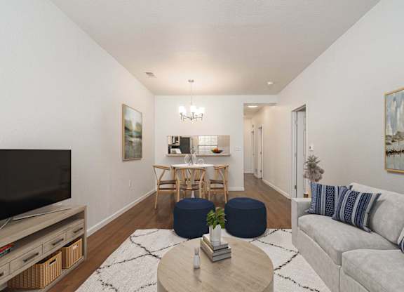 Living room with Television at Woodland Meadows, Clinton Township