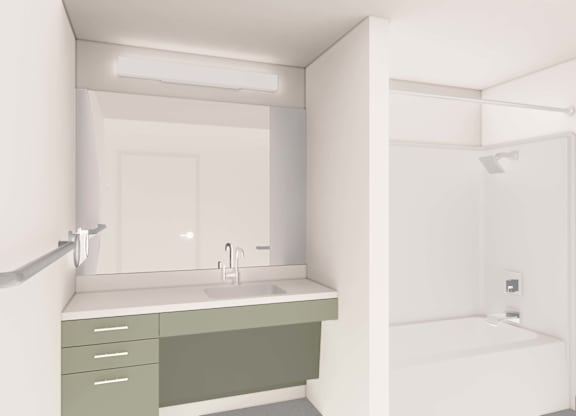 A white bathroom with a sink and a shower.