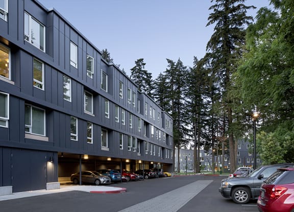 a building with a parking lot in front of it