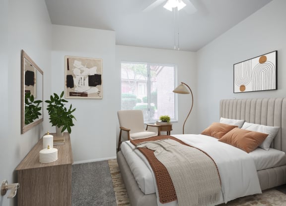 a bedroom with a large bed and a window