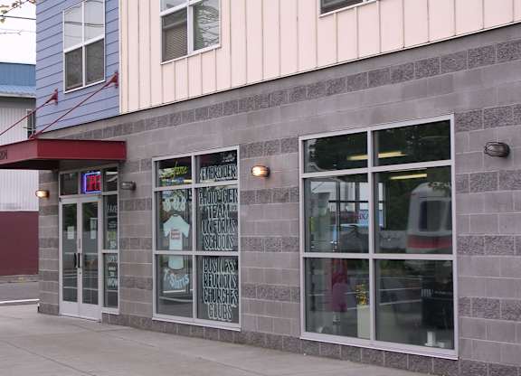 A building with a red awning and a sign that says CPE.