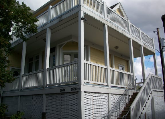 a view of the front porch of an old house