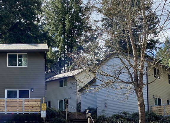a house with a tree in front of it