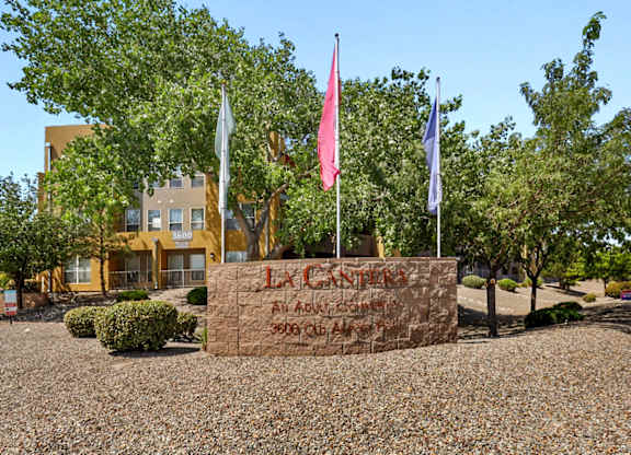A sign in front of a building that says Lakeside.